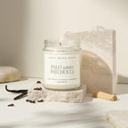 Sweet Water Decor Palo Santo Patchouli Candle - Soy Clove, Vanilla, Patchouli, Cedarwood Scented Spa Candles for Home -9oz Clear Jar + Gold Lid, 40+ Hour Burn Time, Made in The USA