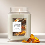 Yankee Candle Large Jar Scented Candle with up to 150 Hour Burn Time, Premium Plant Wax Blend for Consistent Burn, 22 oz Jar Candle with Room Filling Fragrance, Amber & Sandalwood