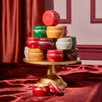 Capri Blue Glimmer Mini Tin - Apple Scented Candle with Mini Candle Holder - Soy Wax Blend - Capri Blue Apple Cider Social Red and Gold (3 oz)