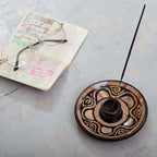 NOVICA Artisan Handmade Ceramic Incense Holder Round Warm Hues Black Multicolor Peru 'Vics Spirit'