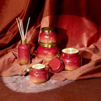 Capri Blue Glimmer Mini Tin - Apple Scented Candle with Mini Candle Holder - Soy Wax Blend - Capri Blue Apple Cider Social Red and Gold (3 oz)